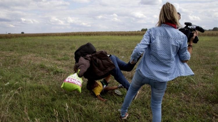 Hungarian Top Court Clears Camerawoman Who Kicked Migrants