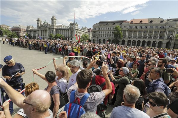 Police Escort Demonstrators Out Of Kossuth Square
