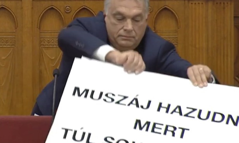 Video: Hungarian MP Interrupts PM Orban's Speech In Parliament Using 'Lies' Sign