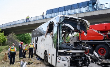 Watch: Firefighters Pull Overturned Bus Upright After Deadly Crash in Hungary