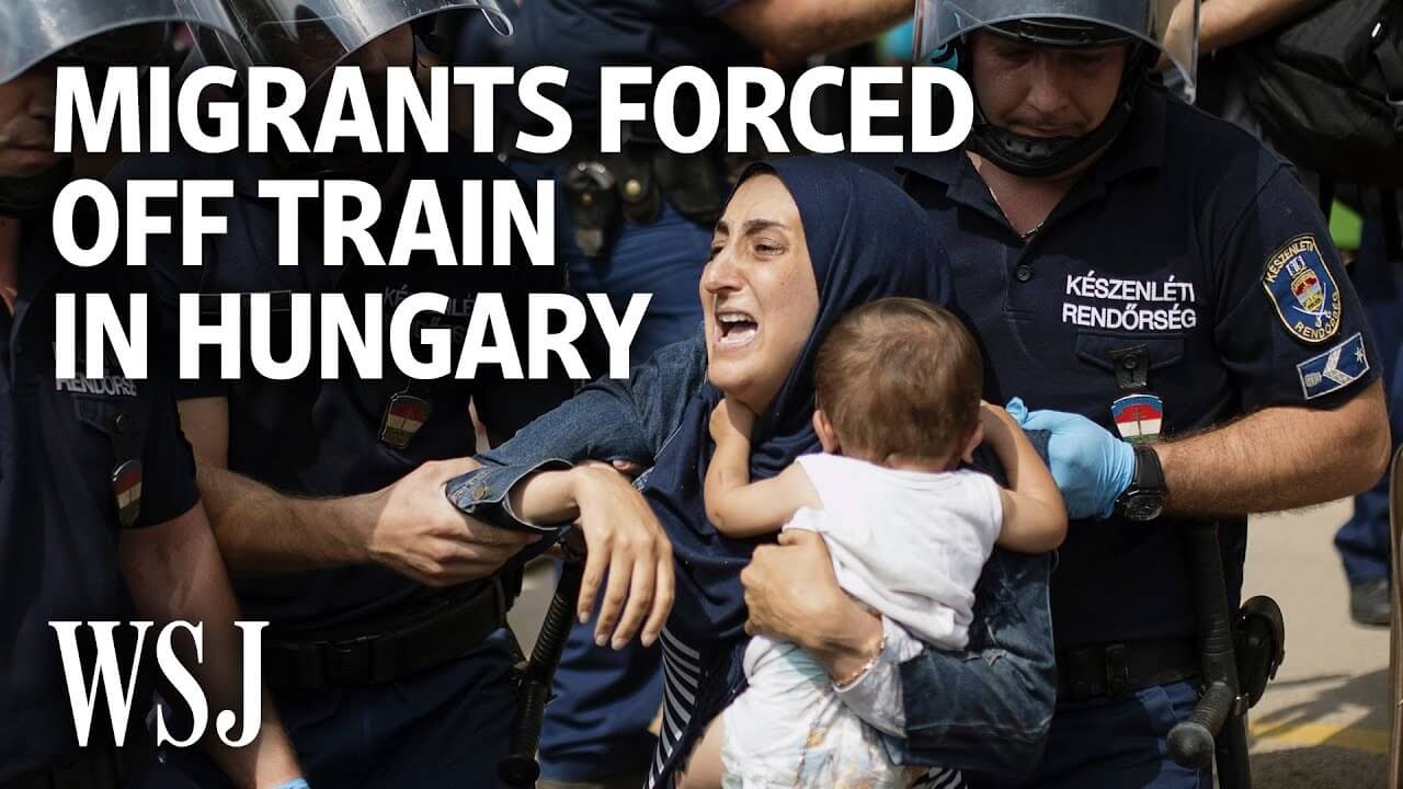 Watch: Armed Police Force Migrants Off Train in Hungary