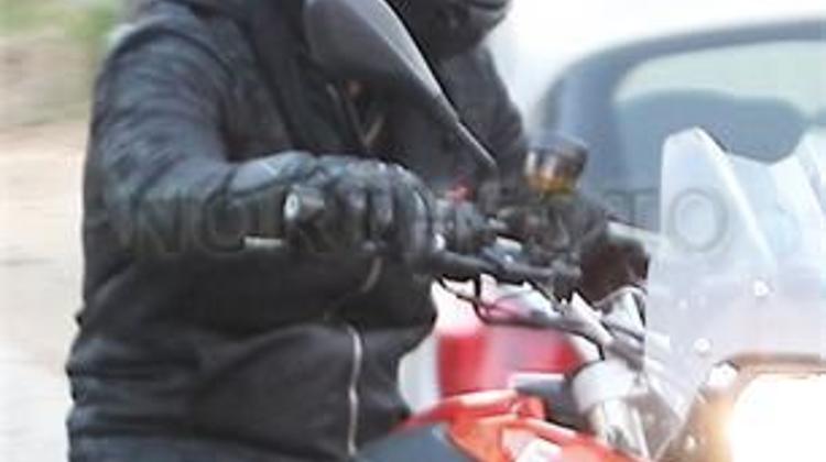 New Photos: Brad Pitt On Moterbike In Budapest