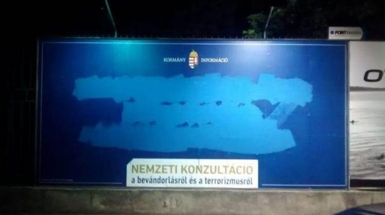 Hungarian Political Activists Deface Government Billboards