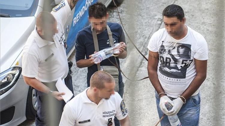 Hungarian Police Take Suspected Human Traffickers Into Custody