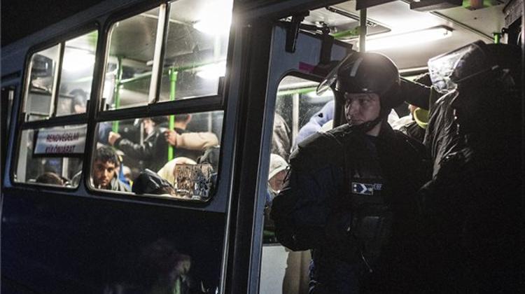 Migrants Board Buses After Fleeing Collection Point In Hungary